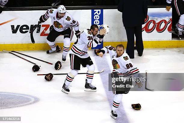 Patrick Kane Dave Bolland of the Chicago Blackhawks celebrates with Marcus Kruger after scoring the game winning goal late in the third period...