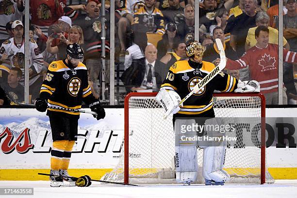 Tuukka Rask of the Boston Bruins and Johnny Boychuk of the Boston Bruins look on after the Chicago Blackhawks scored in the third period in Game Six...