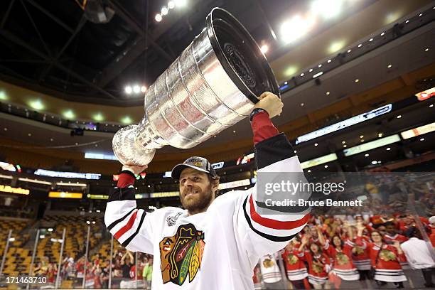 Michal Handzus of the Chicago Blackhawks celebrates with the Stanley Cup after defeated the Boston Bruins 3-2 during Game Six of the 2013 NHL Stanley...