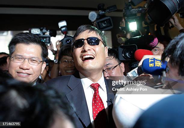 Chinese lawyer and human rights activist Chen Guangcheng arrives at the Legislative Yuan on June 25, 2013 in Taipei, Taiwan. Chen Guangchen currently...