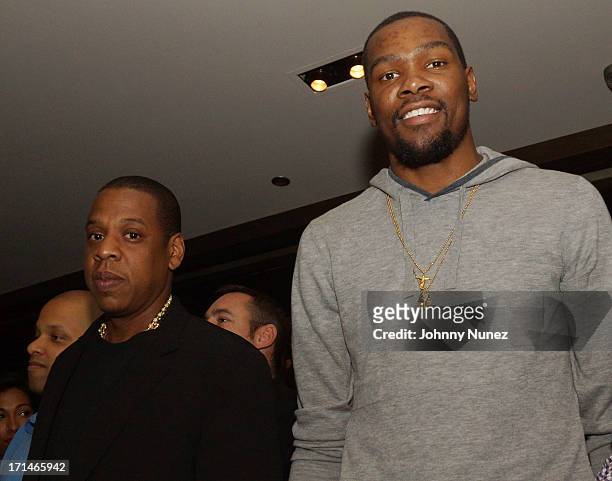 Jay-Z and Kevin Durant attend The "Super Heroes" Fundraiser And Domino Tournament at The 40/40 Club on June 24, 2013 in New York City.