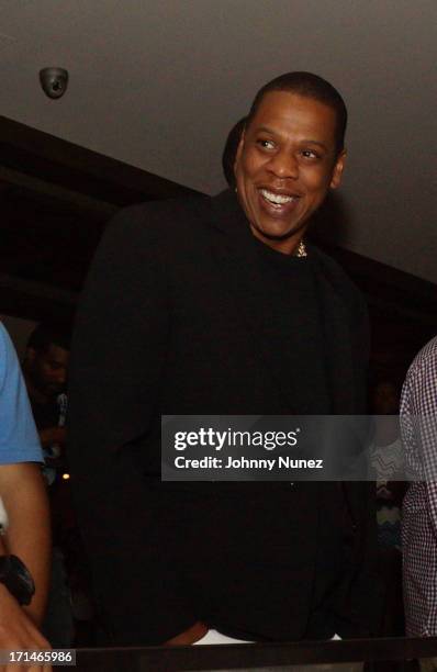 Jay-Z attends The "Super Heroes" Fundraiser And Domino Tournament at The 40/40 Club on June 24, 2013 in New York City.