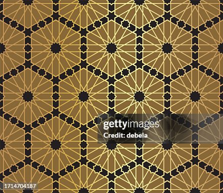 Gold and black Arabic pattern. Ornamental geometric fabric swatch close-up. Gold and black Arabic pattern. Ornamental geometric fabric swatch close-up.