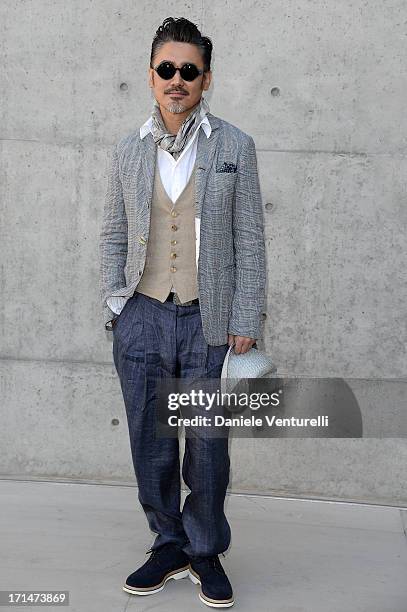 Wu Xiubo attends the Giorgio Armani show during Milan Menswear Fashion Week Spring Summer 2014 on June 25, 2013 in Milan, Italy.