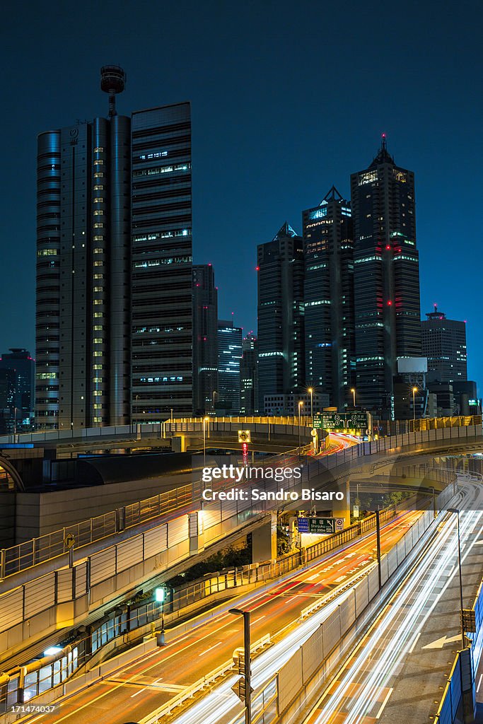 Tokyo Highway with Park Hyatt Hotel at night