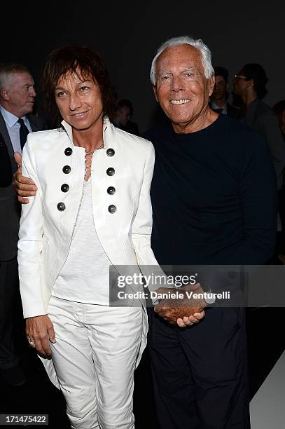 Gianna Nannini and Giorgio Armani pose after the Giorgio Armani show during Milan Menswear Fashion Week Spring Summer 2014on June 25, 2013 in Milan,...