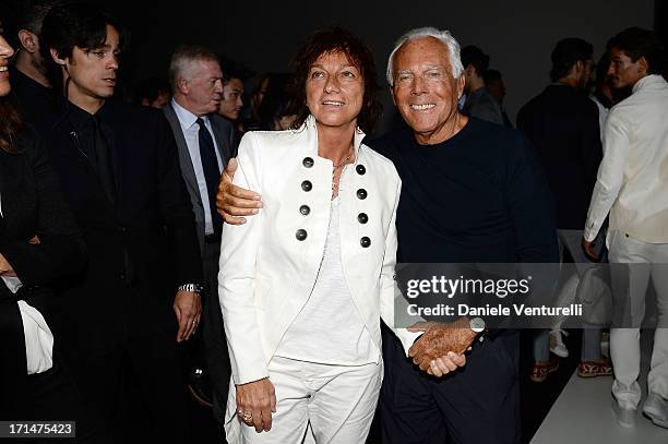 Gianna Nannini and Giorgio Armani pose after the Giorgio Armani show during Milan Menswear Fashion Week Spring Summer 2014on June 25, 2013 in Milan,...