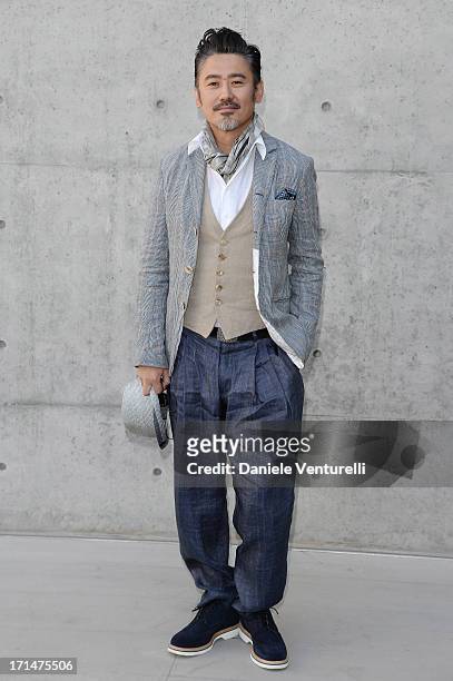 Wu Xiubo attends the Giorgio Armani show during Milan Menswear Fashion Week Spring Summer 2014 on June 25, 2013 in Milan, Italy.