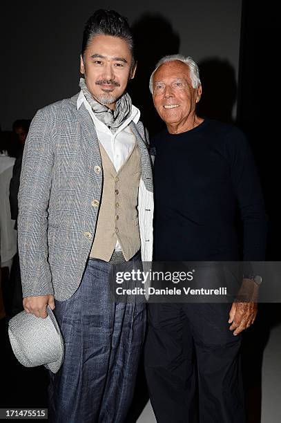 Wu Xiubo and Giorgio Armani attend the Giorgio Armani show during Milan Menswear Fashion Week Spring Summer 2014 on June 25, 2013 in Milan, Italy.