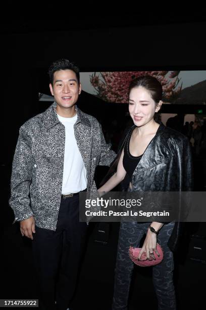 Eric Chou and Ann Hsu attend the Chanel Womenswear Spring/Summer 2024 show as part of Paris Fashion Week on October 03, 2023 in Paris, France.