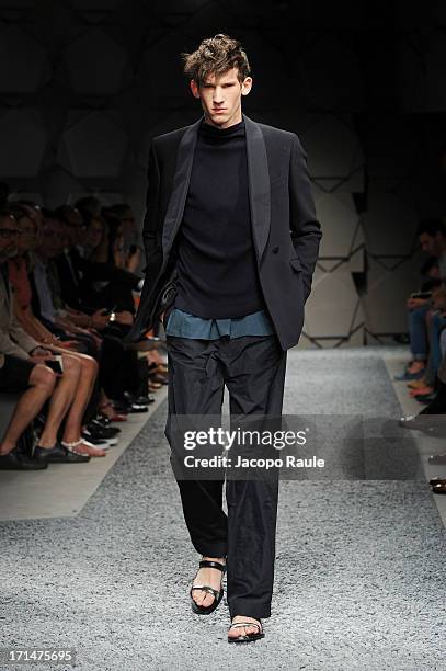 Model walks the runway at the Z Zegna show during Milan Menswear Fashion Week Spring Summer 2014 on June 25, 2013 in Milan, Italy.