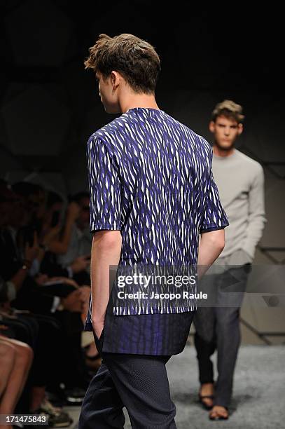 Model walks the runway at the Z Zegna show during Milan Menswear Fashion Week Spring Summer 2014 on June 25, 2013 in Milan, Italy.