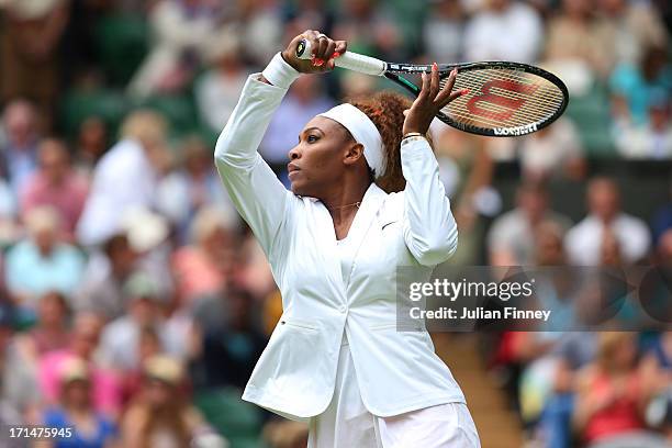 Serena Williams of the United States of America plays a forehand during the warm-up before her Ladies' Singles first round match against Mandy...