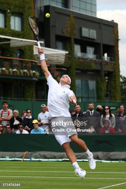 James Duckworth of Australia stretches to return a shot during his Gentlemen's Singles first wround match against Denis Kudla of the United States of...