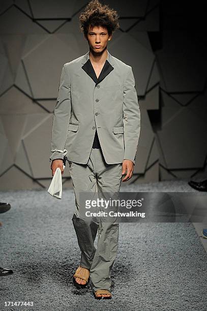 Model walks the runway at the Z Zegna Spring Summer 2014 fashion show during Milan Menswear Fashion Week on June 25, 2013 in Milan, Italy.