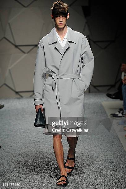 Model walks the runway at the Z Zegna Spring Summer 2014 fashion show during Milan Menswear Fashion Week on June 25, 2013 in Milan, Italy.