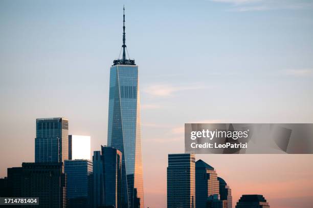 beaytiful sunset in new york lower manhattan - one world trade center - one world trade center stock pictures, royalty-free photos & images