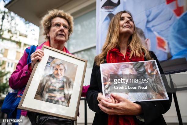 Relatives of those who died during the pandemic gather ahead of the first day of the second phase of the UK Covid-19 public inquiry at Dorland House...