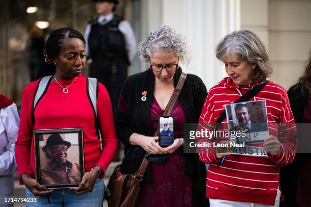 Relatives of those who died during the pandemic gather ahead of the first day of the second phase of the UK Covid-19 public inquiry at Dorland House...