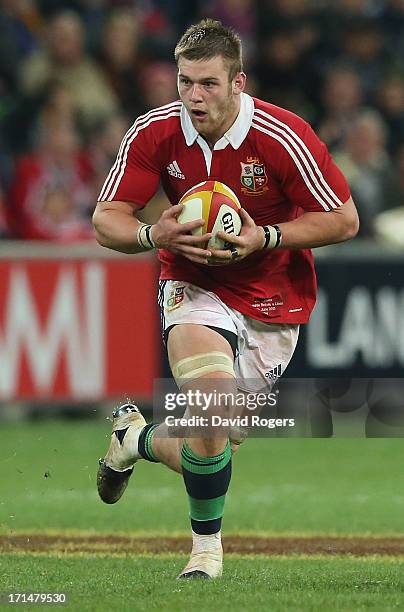 Dan Lydiate of the Lions runs with the ball during the International Tour Match between the Melbourne Rebels and the British & Irish Lions at AAMI...