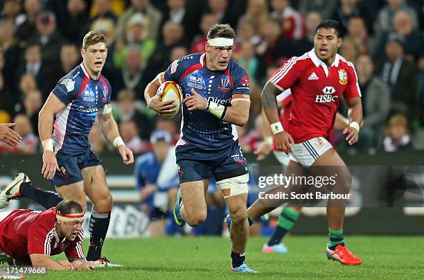 Mitch Inman of the Rebels makes a break during the International Tour Match between the Melbourne Rebels and the British & Irish Lions at AAMI Park...