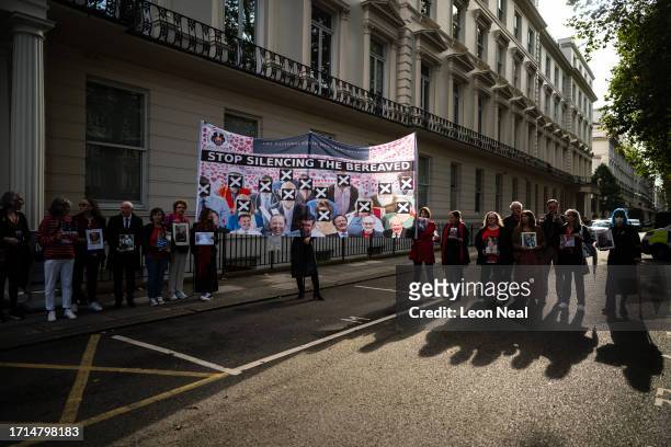 Banner is raised as relatives of those who died during the pandemic gather ahead of the first day of the second phase of the UK Covid-19 public...