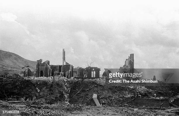 August 1945: The ruins of the Immaculate Conception Cathedral, or Urakami Cathedral, after the US atomic bombing of the Japanese city of Nagasaki on...