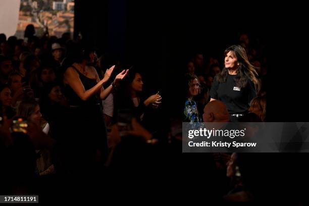 Designer Virginie Viard acknowledges the audience during the Chanel Womenswear Spring/Summer 2024 show as part of Paris Fashion Week on October 03,...