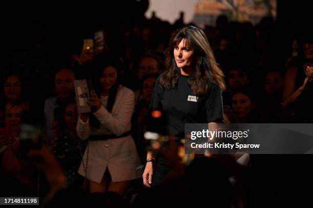 Designer Virginie Viard acknowledges the audience during the Chanel Womenswear Spring/Summer 2024 show as part of Paris Fashion Week on October 03,...