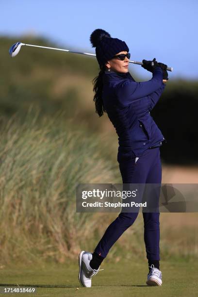 Catherine Zeta-Jones tees off on the sixth hole during a practice round prior to the Alfred Dunhill Links Championship at Kingsbarns Golf Links on...