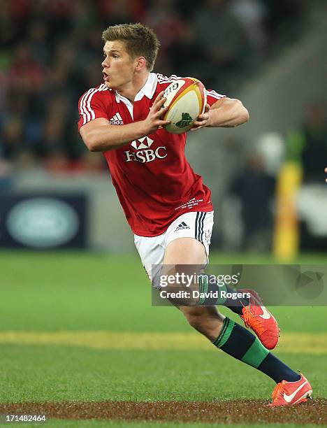 Owen Farrell of the Lions runs with the ball during the International Tour Match between the Melbourne Rebels and the British & Irish Lions at AAMI...