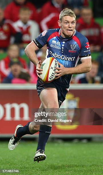 Bryce Hegarty of the Rebels runs with the ball during the International Tour Match between the Melbourne Rebels and the British & Irish Lions at AAMI...