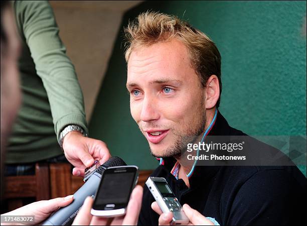Steve Darcis of Belgium speaks to the press the day after his victory against Nadal on day one of Wimbledon on 25 June, 2013 in London, England.