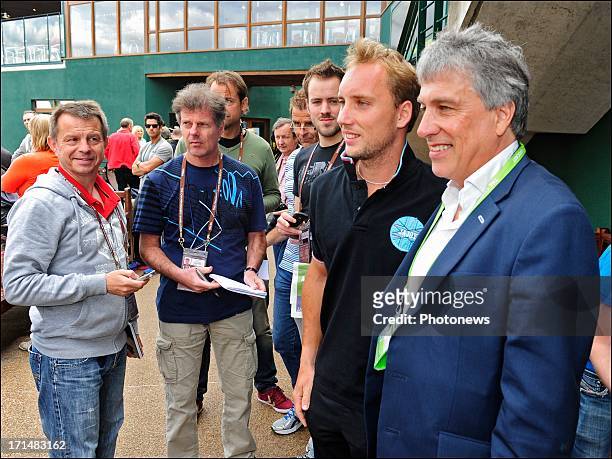 Steve Darcis of Belgium is seen with John Inverdale , the day after his victory against Nadal on day one of Wimbledon on 25 June, 2013 in London,...
