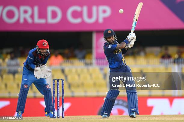 Kusal Mendis of Sri Lanka bats during the ICC Men's Cricket World Cup India 2023 warm up match between Afghanistan and Sri Lanka at Barsapara Cricket...