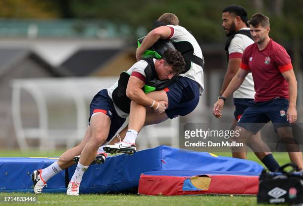 Henry Arundell of England makes a tackle during a training session at Stade Ferdinand Petit on October 03, 2023 in Le Touquet-Paris-Plage, France.