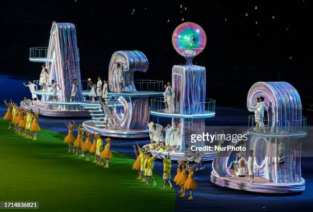 Performers take part in the closing ceremony of the 19th Asian Games Hangzhou 2022 at Olympic Sports Centre Stadium in Hangzhou in China's eastern...