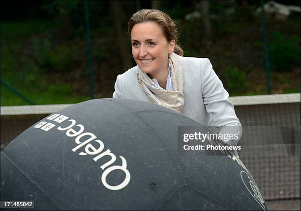 Princess Claire visits a sick child at Camp Tournesol on June 25, 2013 in Spa, Belgium. Camp Tournesol was created to help kids suffering from cancer.