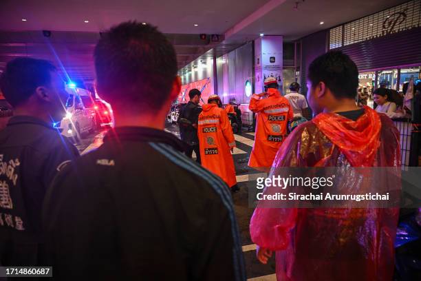 Emergency responders are seen outside the Siam Paragon mall as a shooting incident was still ongoing inside on October 03, 2023 in Bangkok, Thailand....