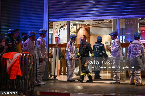 Emergency responders are seen entering the Siam Paragon mall after a shooting incident inside on October 03, 2023 in Bangkok, Thailand. A man opened...