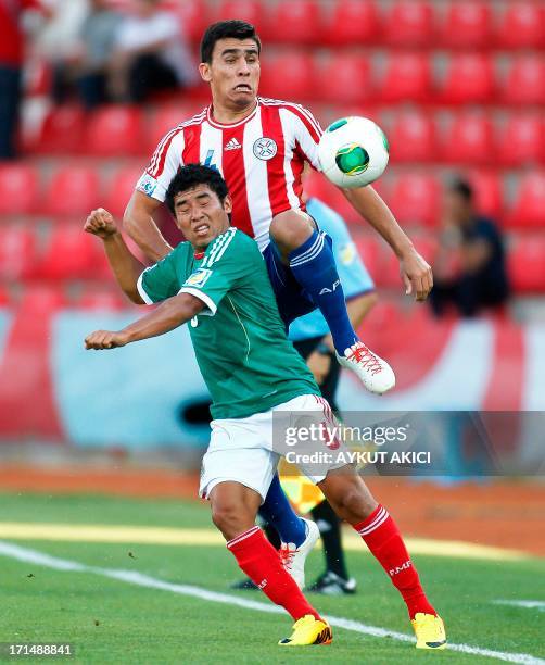 Mexico's Jesus Corona vies with Paraguay's Piris Da Motta during a group stage football match between Mexico and Paraguay at the FIFA Under 20 World...