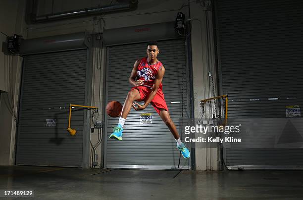 DeAngelo Russell poses during a portrait session at the NBPA Top 100 Camp on June 15, 2013 at John Paul Jones Arena in Charlottesville, Virginia.