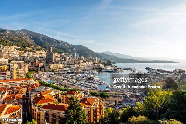 port hercules in la condamine on a sunny morning, monaco - montecarlo fotografías e imágenes de stock