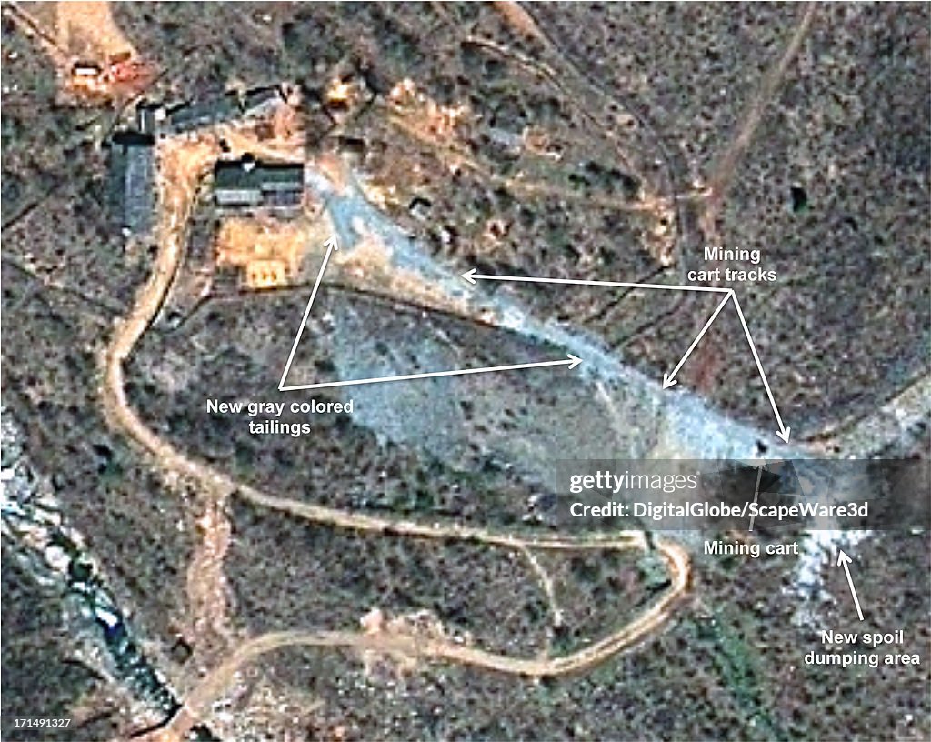 This is Figure 3 -- Tunneling activity is well underway, with visible mining cart tracks and a large amount of spoil/tailings visible.  Published on 38 North.  (DigitalGlobe Satellite Image from May 13, 2013)