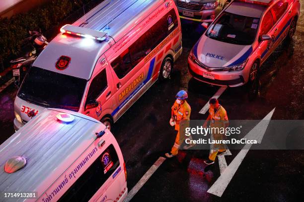 Emergency responders are seen outside the Siam Paragon mall after a shooting incident took place inside on October 03, 2023 in Bangkok, Thailand. A...