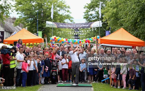 Brett Rumford of Australia hits a shot down Carton Avenue in Maynooth as a preview to The Irish Open at Carton House Golf Club on June 25, 2013 in...