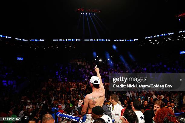 Paulie Malignaggi acknowledges the crowd after his fight with Adrien Broner during their WBA Welterweight Title bout at Barclays Center on June 22,...