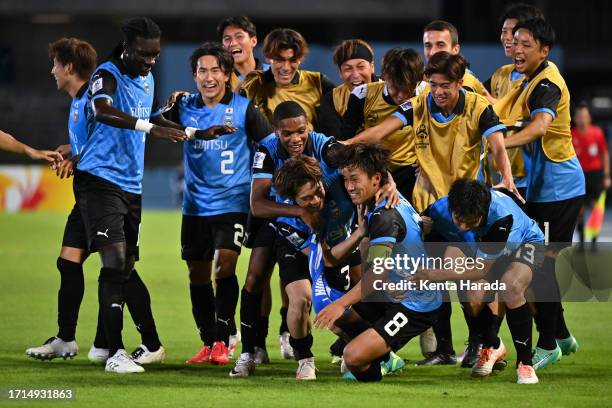 Kento Tachibanada of Kawasaki Frontale celebrates scoring his side's first goal with his teammates during the AFC Champions League Group I match...