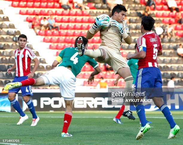 Paraguay's goalkeeper Diego Morel jumps for the ball during the group stage football match between Mexico v Paraguay at the FIFA Under 20 World Cup...