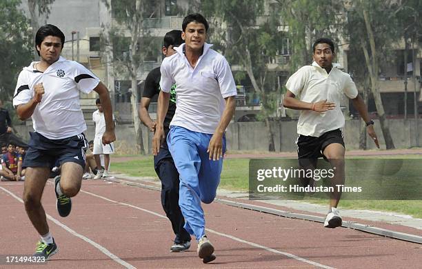 Aspirants gives sports trial for admission in Hindu College at Polo ground, North Campus on June 25, 2013 in New Delhi, India.